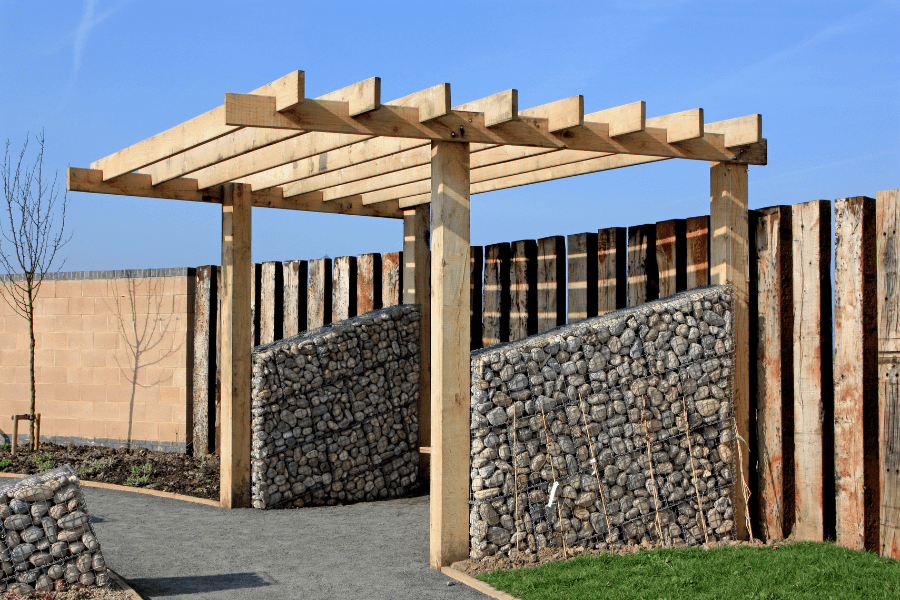 Pergola erected by Elite Carpenters Swansea in rear garden of beach side property near Swansea